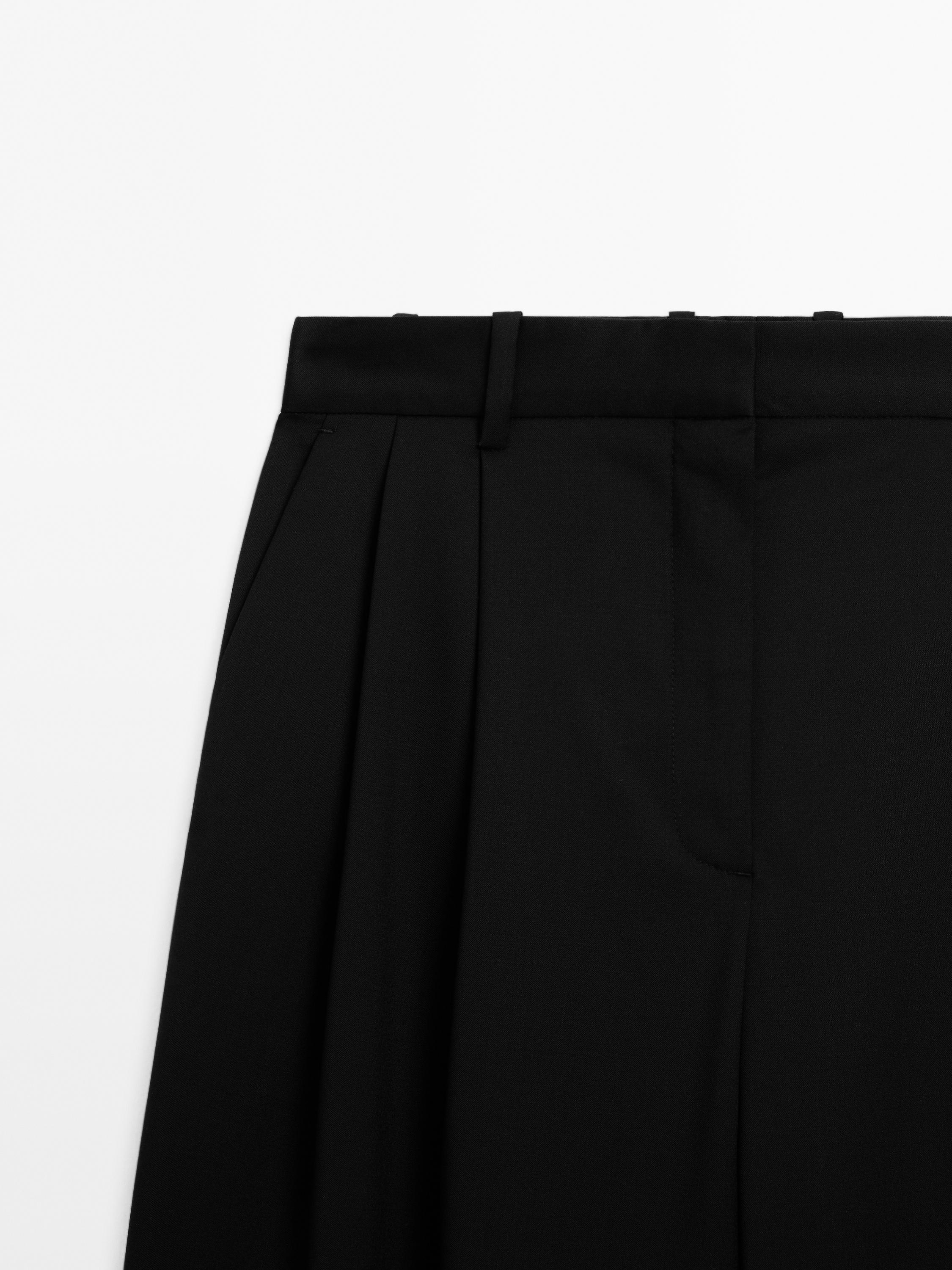 100% extra fine wool pleated trousers